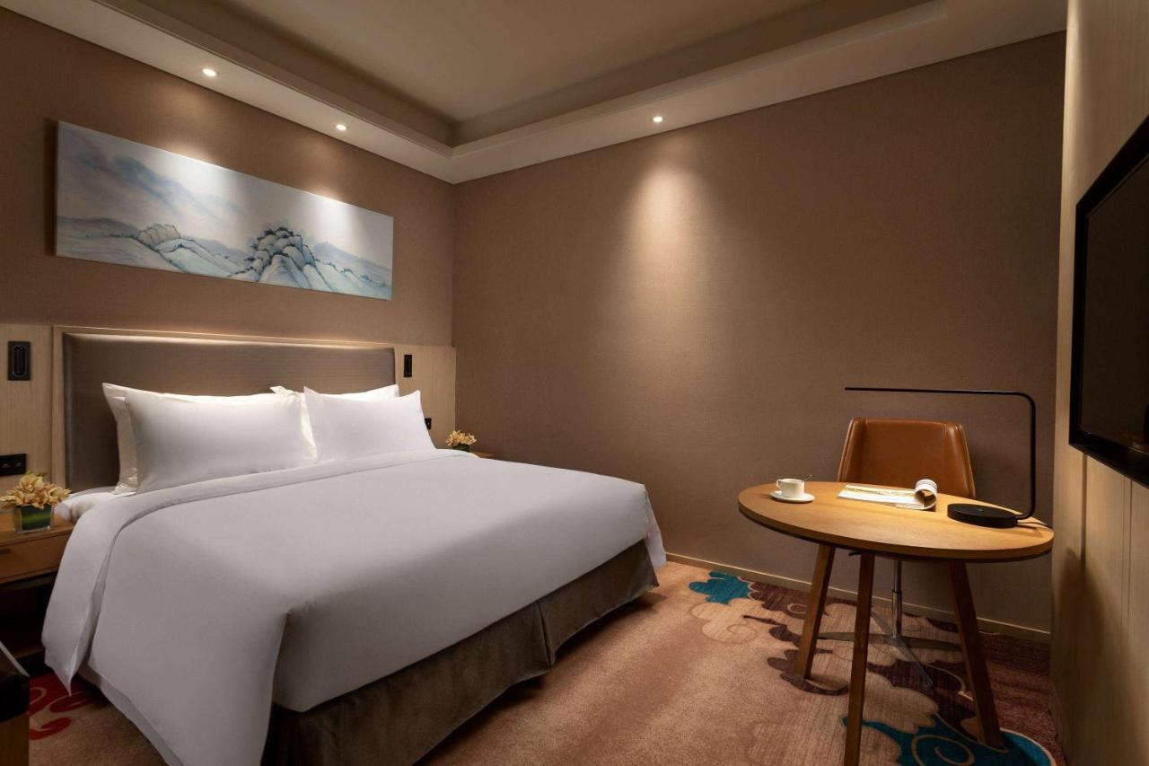 Ramada Wyndham Zhengzhou Xinzheng Xinzheng (Henan) Exterior foto